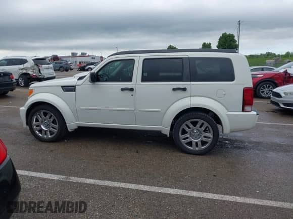 2007 Dodge Nitro R/T with VIN 1D8GU58657W732741, listed as a IAAI auction lot 42145269 with 137,796 mi miles and . Bid and sale history available at DreamBid. Image 14.