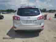2012 Hyundai Santa Fe SE с VIN 5XYZH4AG8CG121070, выставлен на аукционе Copart как лот 69295455 с пробегом 138 134 миль миль и Списание • Salvage title. История ставок и продаж доступна на DreamBid. Изображение 6.