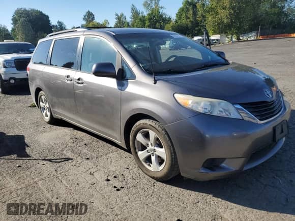 2011 Toyota Sienna LE with VIN 5TDKK3DC7BS121990, listed as a Copart auction lot 80665295 with 234,713 mi miles and Salvage title. Bid and sale history available at DreamBid. Image 4.