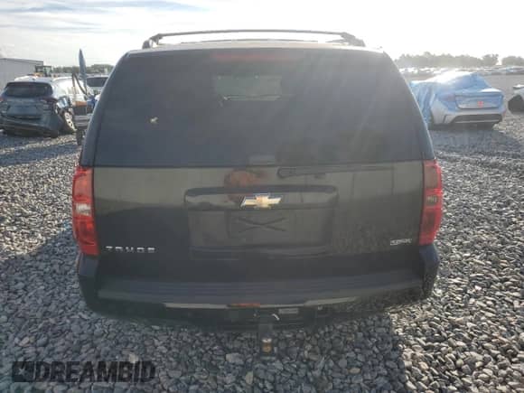 2011 Chevrolet Tahoe LS с VIN 1GNSCAE0XBR223506, выставлен на аукционе Copart как лот 87433045 с пробегом 156 433 миль миль и Списание • Salvage title. История ставок и продаж доступна на DreamBid. Изображение 6.