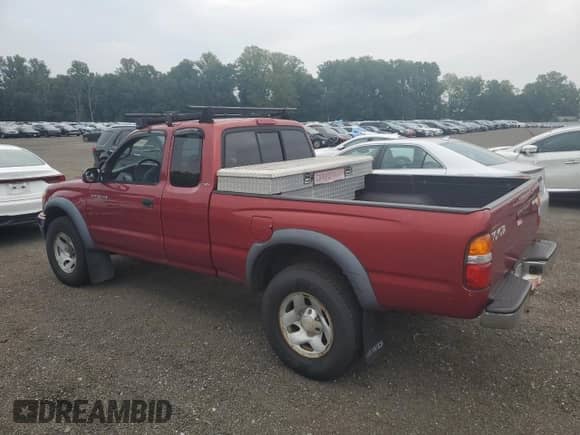 2002 Toyota Tacoma z VIN 5TEWM72N82Z119904, wystawiony jako Copart lot #67544245 z przebiegiem 257 827 mil mil oraz Czysty tytuł • Clean title. Historia ofert i sprzedaży dostępna na DreamBid. Obrazek 2.