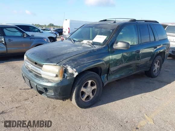 2005 Chevrolet TrailBlazer LS with VIN 1GNDS13S552124587, listed as a IAAI auction lot 43290539 with 163,135 mi miles and . Bid and sale history available at DreamBid. Image 2.