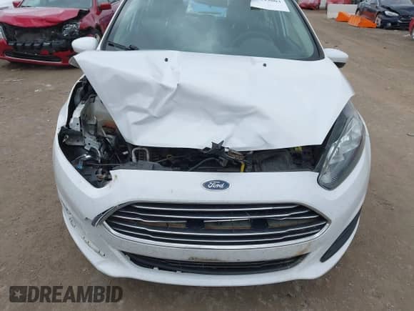 2017 Ford Fiesta S z VIN 3FADP4TJ2HM161814, wystawiony jako IAAI lot #41849003 z przebiegiem 107 836 mil mil oraz . Historia ofert i sprzedaży dostępna na DreamBid. Obrazek 6.