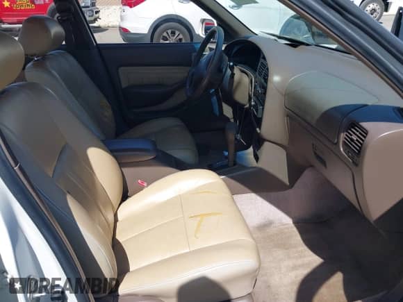 1995 Toyota Camry LE z VIN 4T1GK12E3SU112693, wystawiony jako IAAI lot #42207391 z przebiegiem 190 527 mil mil oraz . Historia ofert i sprzedaży dostępna na DreamBid. Obrazek 5.