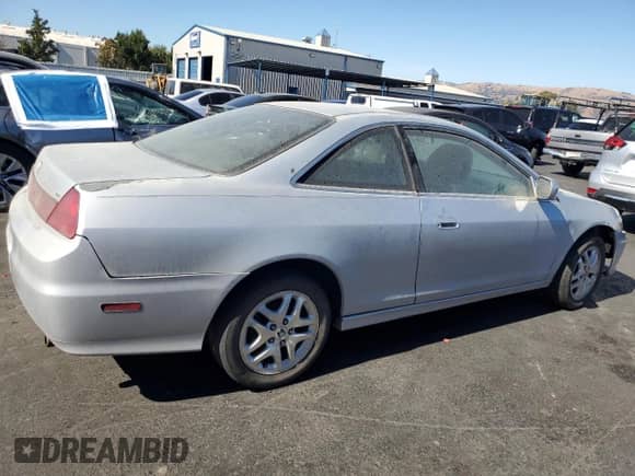 2002 Honda Accord EX with VIN 1HGCG22572A023495, listed as a Copart auction lot 71308015 with 177,408 mi miles and Salvage title. Bid and sale history available at DreamBid. Image 3.