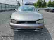 1993 Toyota Camry с VIN 4T1VK13E1PU075530, выставлен на аукционе Copart как лот 64218835 с пробегом 58 871 миль миль и Списание • Salvage title. История ставок и продаж доступна на DreamBid. Изображение 5.