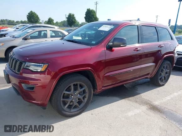 2021 Jeep Grand Cherokee 80th Anniversary z VIN 1C4RJFBG9MC652993, wystawiony jako IAAI lot #42582621 z przebiegiem 65 873 mil mil oraz . Historia ofert i sprzedaży dostępna na DreamBid. Obrazek 19.