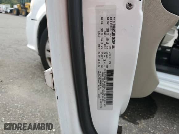 2015 Dodge Grand Caravan SE Plus with VIN 2C4RDGBG7FR558618, listed as a Copart auction lot 81121815 with 180,716 mi miles and Salvage title. Bid and sale history available at DreamBid. Image 13.