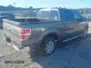 2013 Ford F-150 Lariat with VIN 1FTFW1ET5DKE51436, listed as a IAAI auction lot 43459885 with 149,455 mi miles and . Bid and sale history available at DreamBid. Image 4.