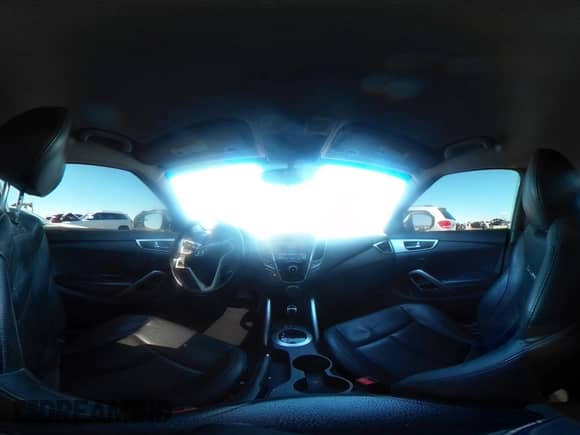 2014 Hyundai Veloster z VIN KMHTC6AD4EU213537, wystawiony jako IAAI lot #43358808 z przebiegiem 54 973 mil mil oraz . Historia ofert i sprzedaży dostępna na DreamBid. Obrazek 18.