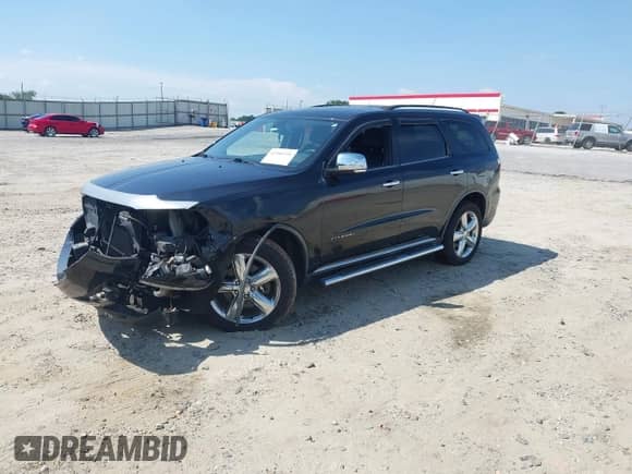 2012 Dodge Durango Citadel with VIN 1C4SDHET0CC112539, listed as a IAAI auction lot 42581926 with 150,429 mi miles and . Bid and sale history available at DreamBid. Image 2.