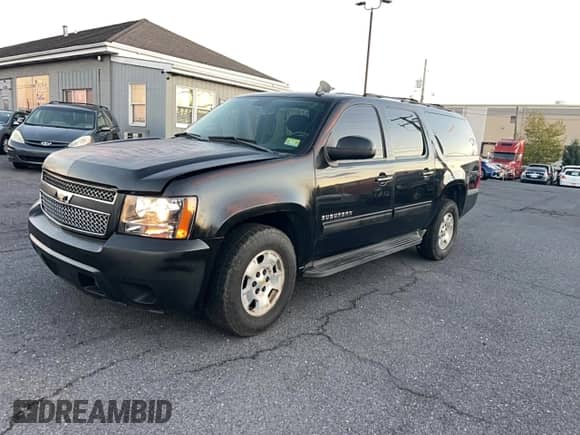 2012 Chevrolet Suburban LT z VIN 1GNSKJE78CR123521, wystawiony jako Copart lot #87484195 z przebiegiem 167 075 mil mil oraz Czysty tytuł • Clean title. Historia ofert i sprzedaży dostępna na DreamBid. Obrazek 2.