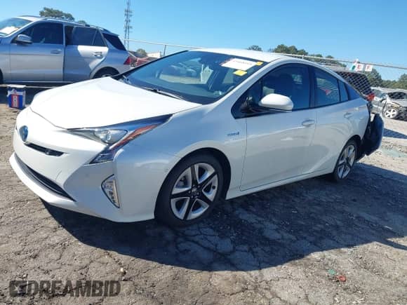 2017 Toyota Prius Two Eco with VIN JTDKARFU1H3045690, listed as a IAAI auction lot 43468495 with 47,724 mi miles and . Bid and sale history available at DreamBid. Image 2.