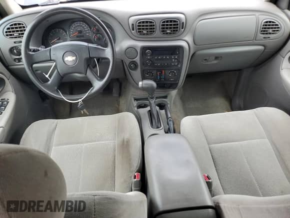 2005 Chevrolet TrailBlazer LS с VIN 1GNDS13S952388735, выставлен на аукционе Copart как лот 61349805 с пробегом 246 128 миль миль и Чистый • Clean title. История ставок и продаж доступна на DreamBid. Изображение 8.