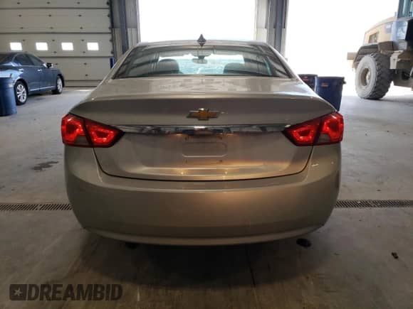 2018 Chevrolet Impala LS с VIN 1G11X5SA8JU133918, выставлен на аукционе Copart как лот 42594425 с пробегом 118 587 миль миль и Списание • Salvage title. История ставок и продаж доступна на DreamBid. Изображение 6.