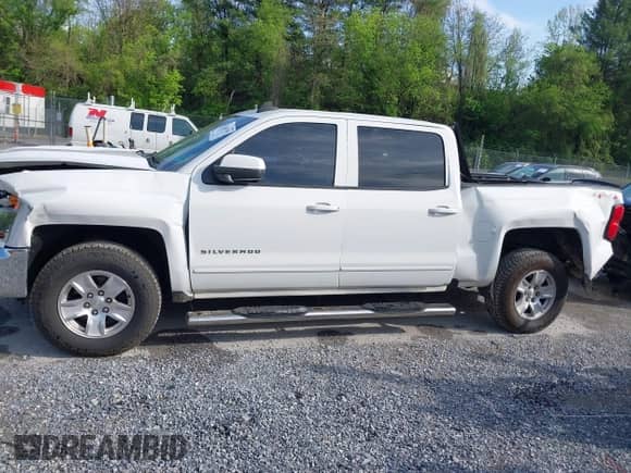 2016 Chevrolet Silverado 1500 LT with VIN 3GCUKREC7GG375859, listed as a IAAI auction lot 42151765 with 184,627 mi miles and . Bid and sale history available at DreamBid. Image 14.