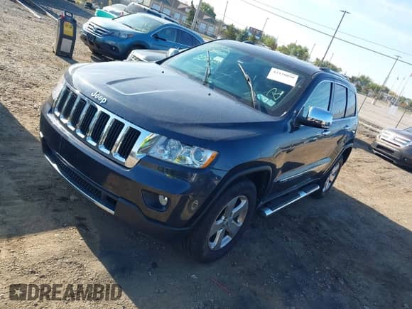 2013 Jeep Grand Cherokee Limited z VIN 1C4RJFBG4DC648995, wystawiony jako IAAI lot #43338050 z przebiegiem 138 551 mil mil oraz . Historia ofert i sprzedaży dostępna na DreamBid. Obrazek 2.