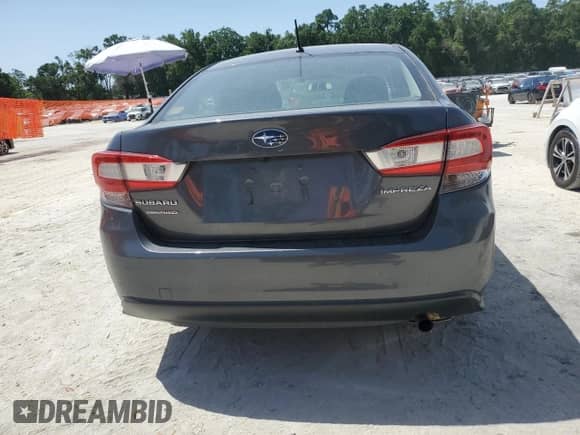 2021 Subaru Impreza с VIN 4S3GKAB67M3602270, выставлен на аукционе Copart как лот 57034895 с пробегом 55 783 миль миль и Списание • Salvage title. История ставок и продаж доступна на DreamBid. Изображение 6.