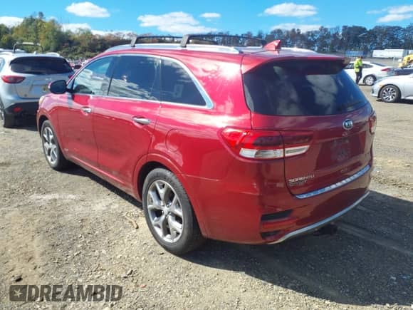 2016 Kia Sorento SXL with VIN 5XYPKDA50GG169305, listed as a IAAI auction lot 43435191 with 123,949 mi miles and . Bid and sale history available at DreamBid. Image 3.