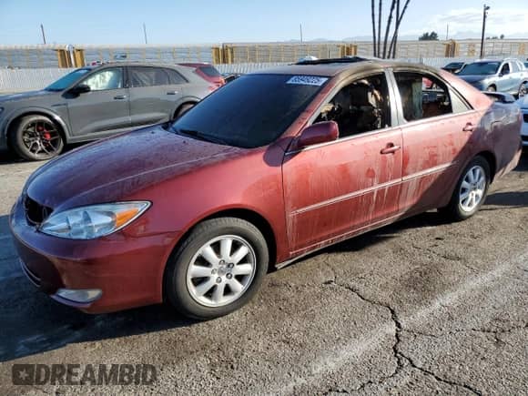 2004 Toyota Camry XLE с VIN 4T1BF30K04U080419, выставлен на аукционе Copart как лот 85949225 с пробегом Не указан миль и Списание • Salvage title. История ставок и продаж доступна на DreamBid. Изображение 1.