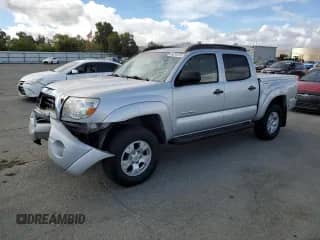 2005 Toyota Tacoma PreRunner with VIN 5TEJU62N95Z057731, listed as a Copart auction lot 84291675 with 252,044 mi miles and Salvage title. Bid and sale history available at DreamBid. Image 1.