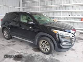 2017 Hyundai Tucson SE with VIN KM8J33A40HU488798, listed as a IAAI auction lot 42602078 with 61,376 mi miles and . Bid and sale history available at DreamBid. Image 1.