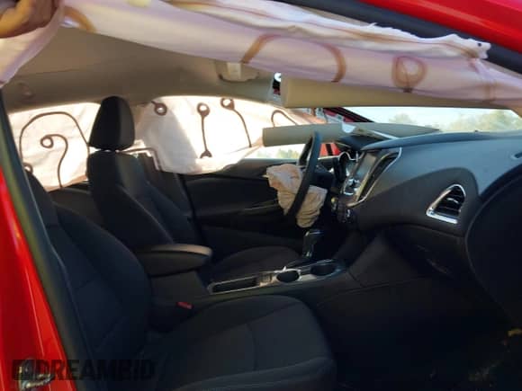 2016 Chevrolet Cruze LT z VIN 1G1BE5SM6G7325320, wystawiony jako IAAI lot #43367649 z przebiegiem 128 471 mil mil oraz . Historia ofert i sprzedaży dostępna na DreamBid. Obrazek 5.