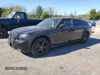 2005 Dodge Magnum SXT with VIN 2D4GZ48V55H537464, listed as a Copart auction lot 85140395 with 83,980 mi miles and Clean title. Bid and sale history available at DreamBid. Image 1.