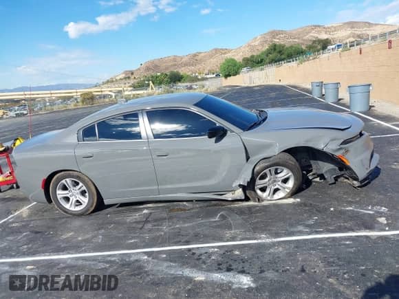 2023 Dodge Charger SXT z VIN 2C3CDXBG3PH656613, wystawiony jako IAAI lot #43252575 z przebiegiem 26 506 mil mil oraz . Historia ofert i sprzedaży dostępna na DreamBid. Obrazek 13.