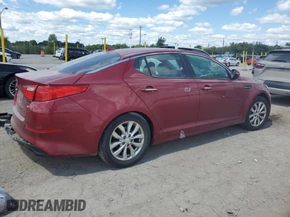 2015 Kia Optima LX z VIN 5XXGM4A75FG470893, wystawiony jako Copart lot #70469895 z przebiegiem 196 151 mil mil oraz Szkoda całkowita • Salvage title. Historia ofert i sprzedaży dostępna na DreamBid. Obrazek 3.
