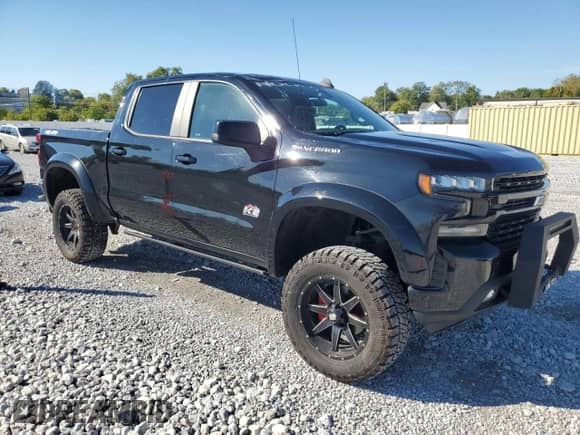 2019 Chevrolet Silverado 1500 RST with VIN 1GCUYEED1KZ322874, listed as a Copart auction lot 82314645 with 110,426 mi miles and Salvage title. Bid and sale history available at DreamBid. Image 4.