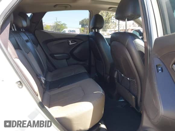 2012 Hyundai Tucson GLS with VIN KM8JU3AC9CU369869, listed as a IAAI auction lot 41997827 with 148,728 mi miles and . Bid and sale history available at DreamBid. Image 8.