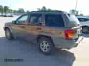 2001 Jeep Grand Cherokee Laredo с VIN 1J4GX48SX1C589592, выставлен на аукционе IAAI как лот 42826738 с пробегом 210 459 миль миль и . История ставок и продаж доступна на DreamBid. Изображение 3.