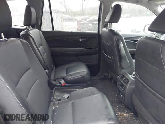 2022 Honda Pilot Touring 7-Passenger z VIN 5FNYF5H61NB013372, wystawiony jako IAAI lot #41595890 z przebiegiem 53 664 mil mil oraz . Historia ofert i sprzedaży dostępna na DreamBid. Obrazek 8.