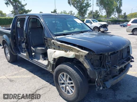2014 Nissan Frontier SV with VIN 1N6AD0ER0EN737884, listed as a IAAI auction lot 42499078 with 165,060 mi miles and . Bid and sale history available at DreamBid. Image 6.