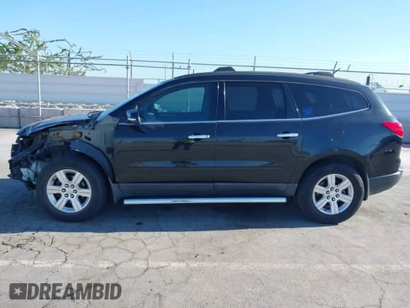 2011 Chevrolet Traverse 2LT with VIN 1GNKRJEDXBJ318115, listed as a IAAI auction lot 43095464 with 166,137 mi miles and . Bid and sale history available at DreamBid. Image 15.
