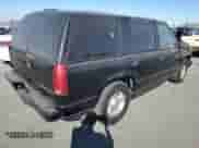 2000 Chevrolet Tahoe Limited z VIN 1GNEC13R7YR221297, wystawiony jako Copart lot #75504254 z przebiegiem 246 714 mil mil oraz Czysty tytuł • Clean title. Historia ofert i sprzedaży dostępna na DreamBid. Obrazek 3.