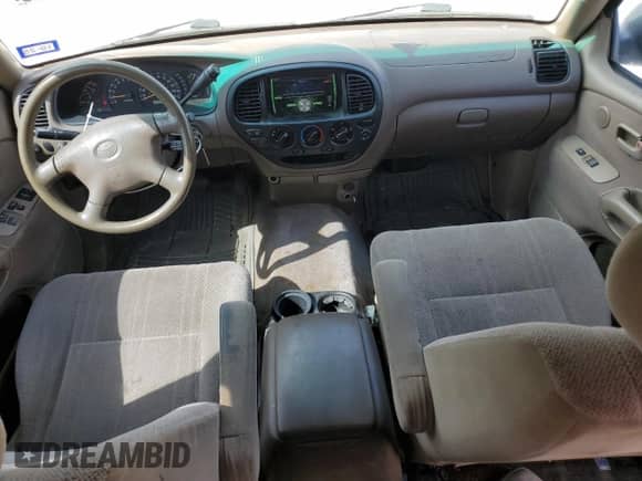 2002 Toyota Tundra SR5 z VIN 5TBRT34132S295977, wystawiony jako Copart lot #82577295 z przebiegiem 218 368 mil mil oraz Czysty tytuł • Clean title. Historia ofert i sprzedaży dostępna na DreamBid. Obrazek 8.