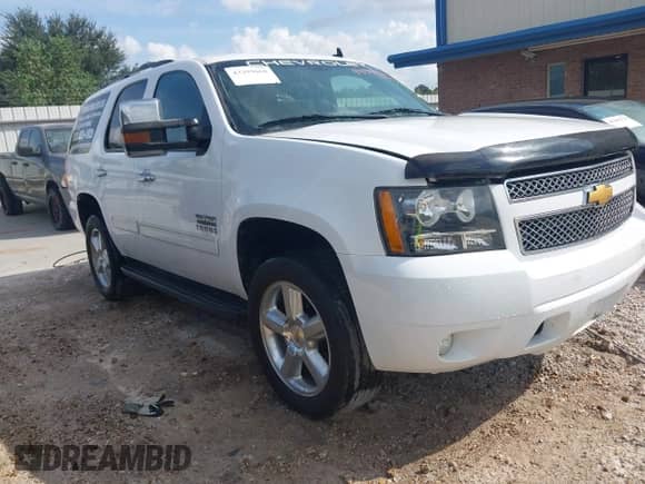 2013 Chevrolet Tahoe LS z VIN 1GNSCAE03DR373556, wystawiony jako IAAI lot #43399660 z przebiegiem 159 400 mil mil oraz . Historia ofert i sprzedaży dostępna na DreamBid. Obrazek 1.