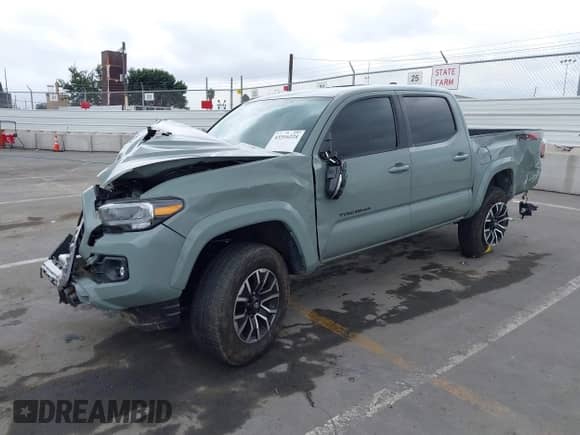 2023 Toyota Tacoma SR z VIN 3TMCZ5ANXPM631484, wystawiony jako IAAI lot #43316224 z przebiegiem 31 823 mil mil oraz . Historia ofert i sprzedaży dostępna na DreamBid. Obrazek 18.