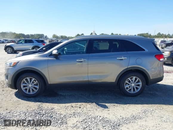 2018 Kia Sorento LX z VIN 5XYPG4A33JG416825, wystawiony jako IAAI lot #43535898 z przebiegiem 193 181 mil mil oraz . Historia ofert i sprzedaży dostępna na DreamBid. Obrazek 14.