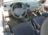 2002 Hyundai Accent z VIN KMHCF35G72U217653, wystawiony jako Copart lot #70099915 z przebiegiem 168 308 mil mil oraz Szkoda całkowita • Salvage title. Historia ofert i sprzedaży dostępna na DreamBid. Obrazek 8.