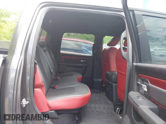 2015 Ram 1500 Rebel with VIN 1C6RR7YTXFS785507, listed as a IAAI auction lot 42172925 with 100,201 mi miles and . Bid and sale history available at DreamBid. Image 8.