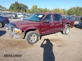 2002 Dodge Dakota SLT z VIN 1B7HG48N82S552357, wystawiony jako IAAI lot #43498260 z przebiegiem 192 220 mil mil oraz . Historia ofert i sprzedaży dostępna na DreamBid. Obrazek 2.