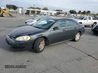 2013 Chevrolet Impala LT with VIN 2G1WG5E31D1238061, listed as a Copart auction lot 81953945 with 218,579 mi miles and Salvage title. Bid and sale history available at DreamBid. Image 1.