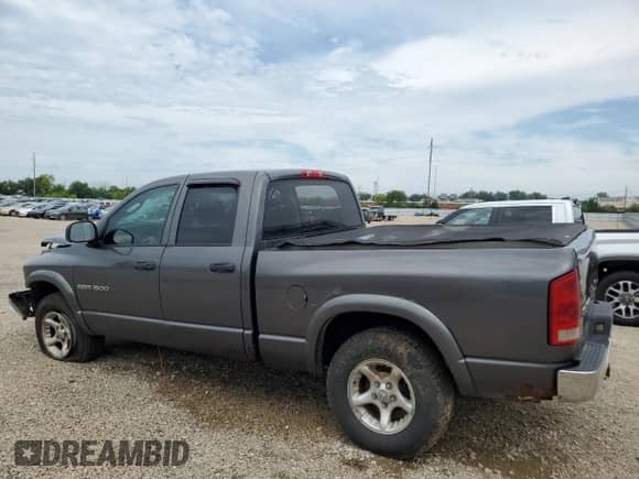 2004 Dodge 1500 SLT with VIN 1D7HU18D74S619053, listed as a Copart auction lot 68474175 with 231,726 mi miles and Salvage title. Bid and sale history available at DreamBid. Image 2.