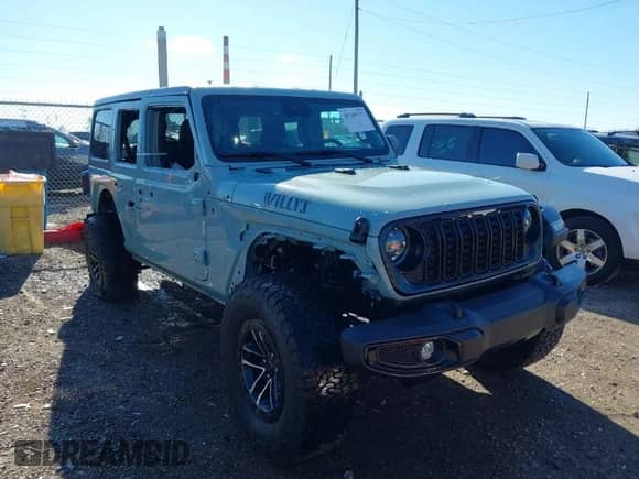 2024 Jeep Wrangler Willys with VIN 1C4RJXDNXRW135984, listed as a IAAI auction lot 40789537 with 6,609 mi miles and . Bid and sale history available at DreamBid. Image 1.