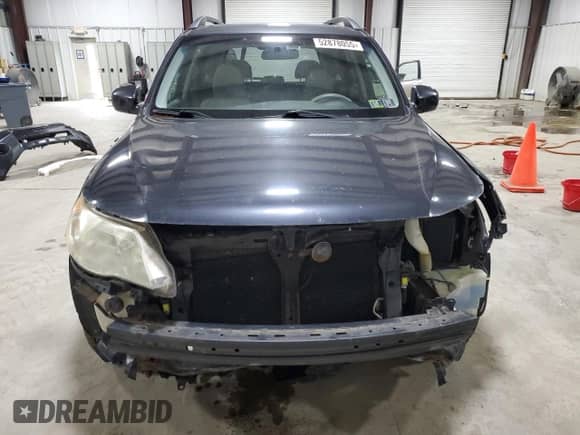 2009 Subaru Forester X z VIN JF2SH63619G790712, wystawiony jako Copart lot #52878055 z przebiegiem 91 290 mil mil oraz Szkoda całkowita • Salvage title. Historia ofert i sprzedaży dostępna na DreamBid. Obrazek 5.