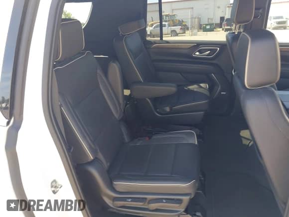 2023 Chevrolet Suburban Premier with VIN 1GNSCFKD3PR300227, listed as a IAAI auction lot 42809344 with 66,261 mi miles and . Bid and sale history available at DreamBid. Image 8.