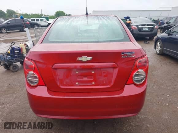 2014 Chevrolet Sonic LS with VIN 1G1JA5SH0E4130239, listed as a IAAI auction lot 42193639 with 124,503 mi miles and . Bid and sale history available at DreamBid. Image 16.